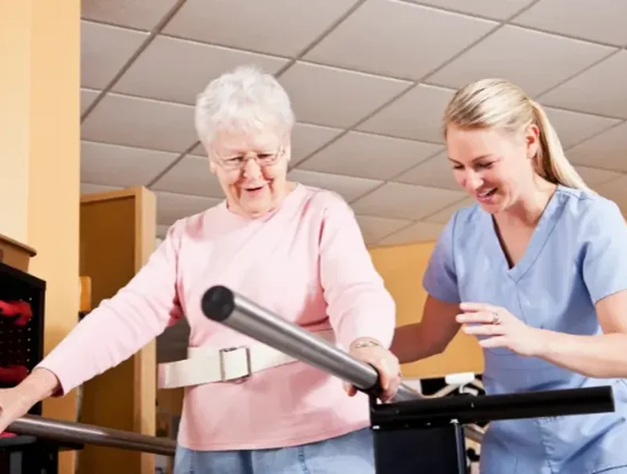 Physical therapist guiding a patient through a one-on-one session